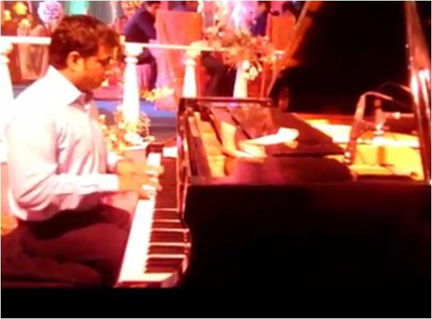 male piano player noida